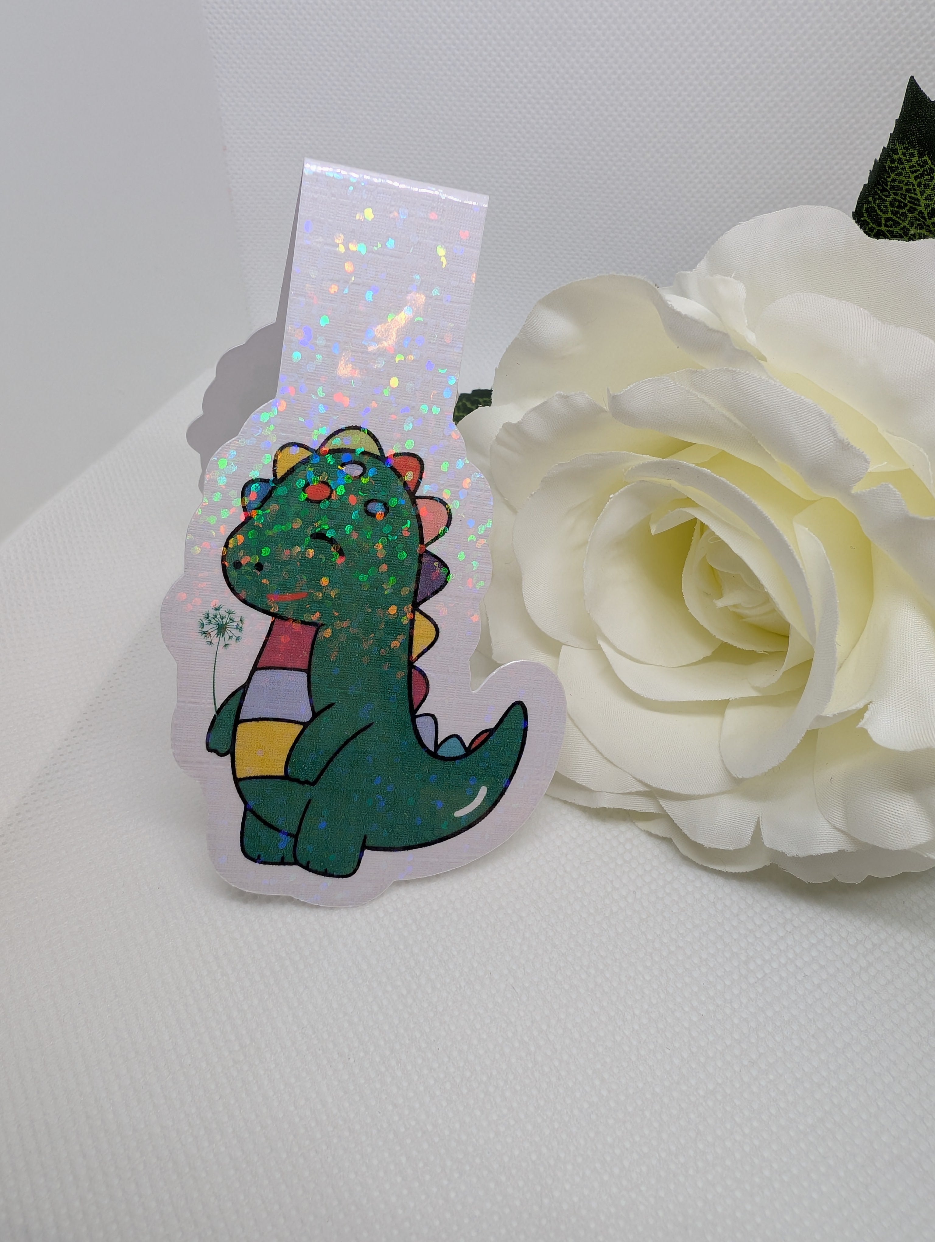 Magnetisches Lesezeichen Dino mit Blume